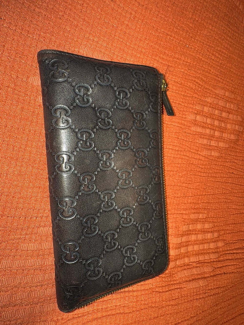 Gucci Black Embossed GG Zip-Around Wallet